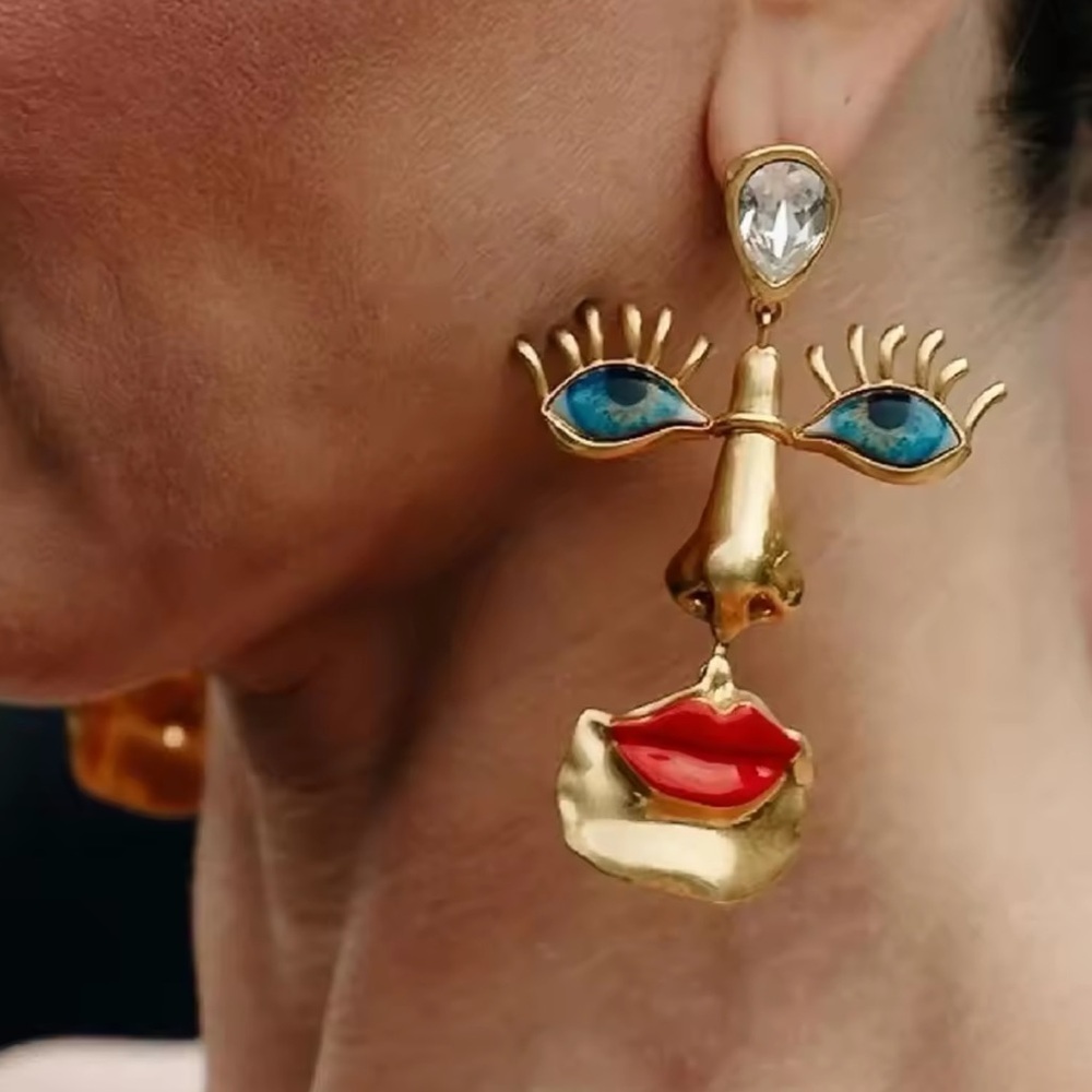 Visage Surrealism Gold Blue Eyes Earrings